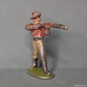Juguetes antiguos: Cowboy tirando con rifle, serie Far West. Quiralu, años 50